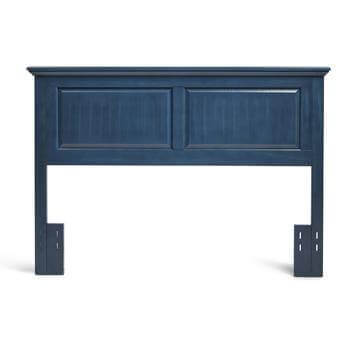 Cottage style blue wood headboard, featuring a timeless design and durable craftsmanship for elegant bedroom décor.