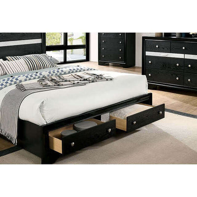 Chrissy Black 4pc Bedroom Set featuring a sleek bed with under-bed storage and stylish decor in a modern room setting.