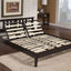 Ergo-Pedic Essentials adjustable bed frame with wooden slats and head-up functionality in a modern bedroom setting.