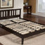 Modern wooden slat bed frame in a stylish room, showcasing durability and support for any mattress.