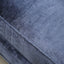 Close-up of the soft satin blue fabric on the Jodie contemporary sofa, showcasing its rich texture and color.