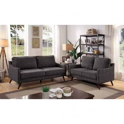 Maxime Gray Mid Century Loveseat in stylish living room with tapered legs and box cushions, showcasing modern décor.