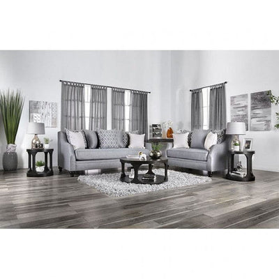 Nefyn Gray Transitional Sofa set in a stylish lounge with decorative pillows and coffee table. Ideal for cozy gatherings.