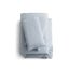 Set of light blue Malouf Supima® cotton pillowcases and sheets, featuring a luxurious sateen weave.