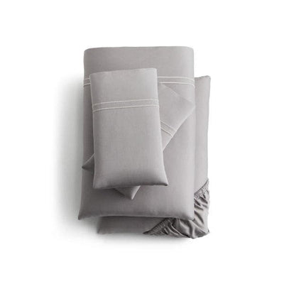 Malouf Premium Flax Natural Supima® Cotton Sheet Set in light gray, featuring deep pockets and luxurious sateen weave.